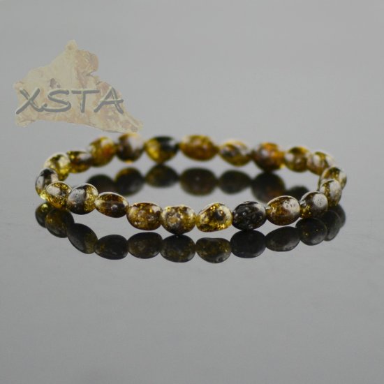 Amber bracelet green color olive beads